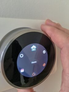 Smart home thermostat technology with hand